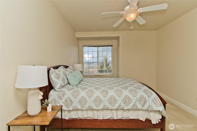 bedroom with carpet flooring and baseboards