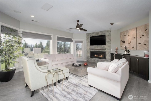 10808 NE 192nd Ave, Brush Prairie, WA 98606 - living room featuring visible vents, a ceiling fan, wood finished floors, recessed lighting, and a large fireplace
