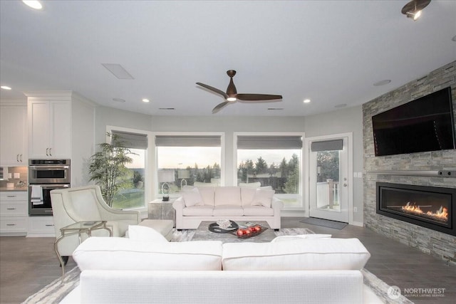 10808 NE 192nd Ave, Brush Prairie, WA 98606 - living area with recessed lighting, a fireplace, and a ceiling fan