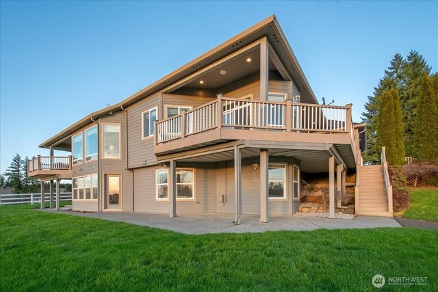 10808 NE 192nd Ave, Brush Prairie, WA 98606 - rear view of house featuring a lawn, a deck, a patio, fence, and stairway