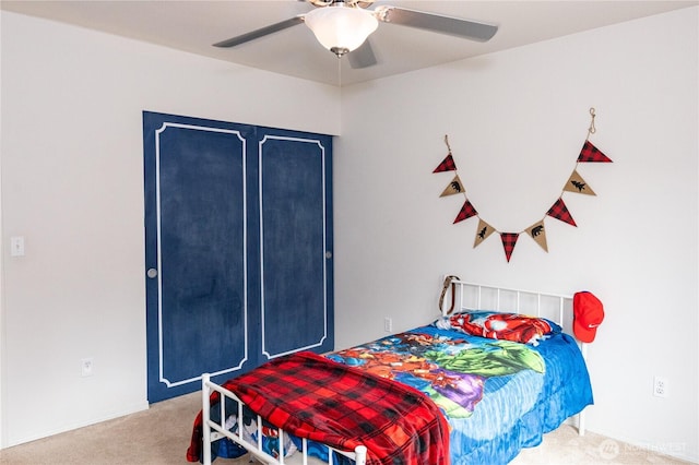 bedroom featuring a ceiling fan and carpet flooring