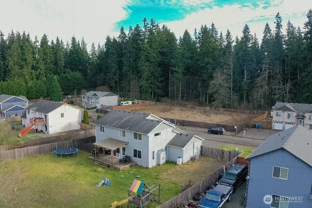 birds eye view of property with a residential view