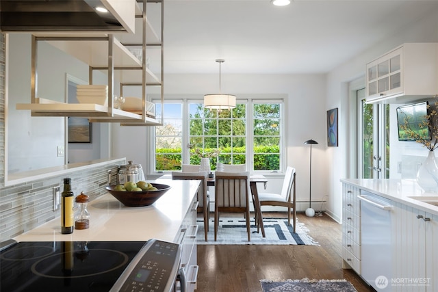 kitchen with white cabinets, electric stove, dark wood-style floors, and breakfast area