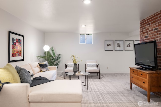 living area featuring recessed lighting, baseboards, and carpet floors