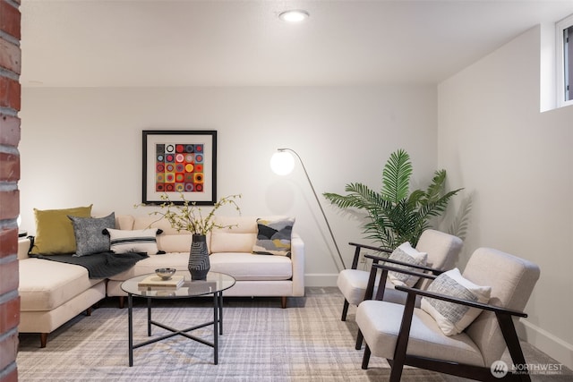 living room featuring baseboards