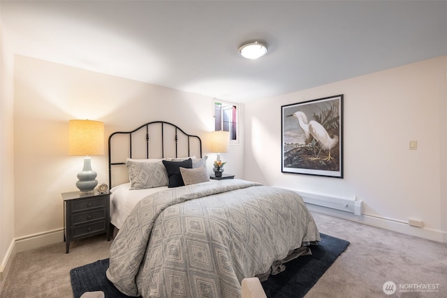 carpeted bedroom with baseboards