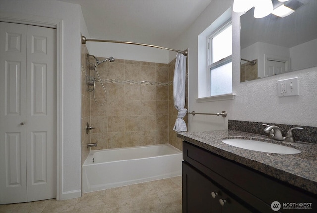 full bath featuring a closet, shower / bath combination with curtain, tile patterned floors, and vanity