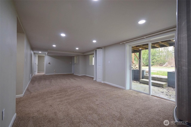 interior space featuring recessed lighting and baseboards