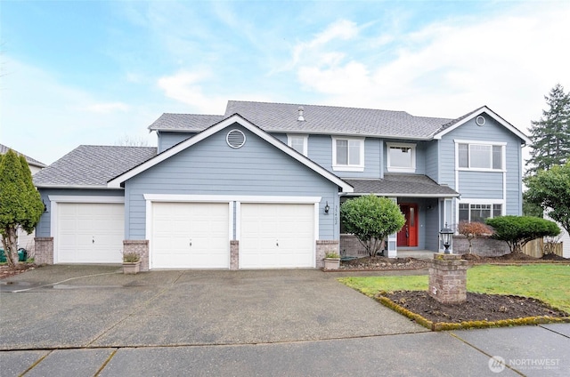 traditional home featuring a garage, driveway, a shingled roof, and brick siding