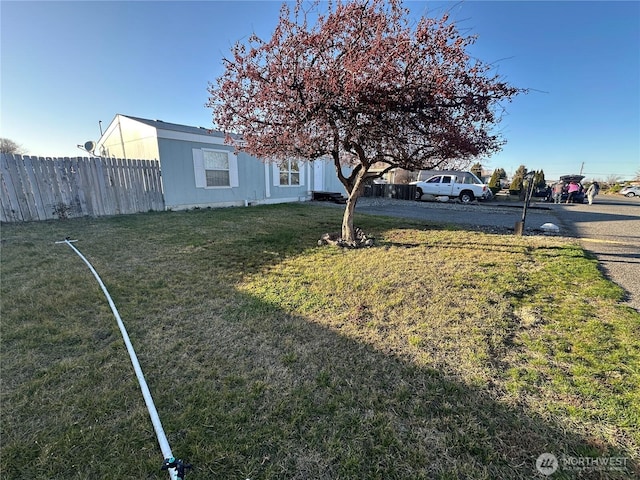 view of yard featuring fence