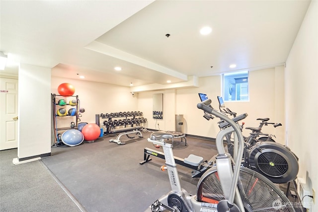 exercise room with recessed lighting