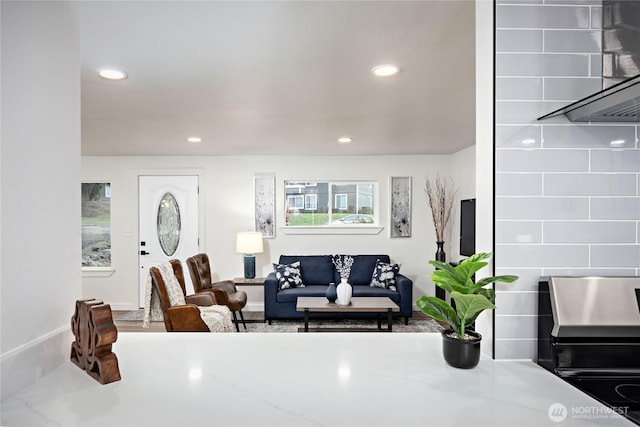 living room featuring recessed lighting