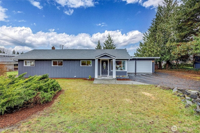 ranch-style house with aphalt driveway, an attached garage, roof with shingles, a chimney, and a front yard