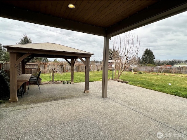 view of patio with a gazebo and a fenced backyard