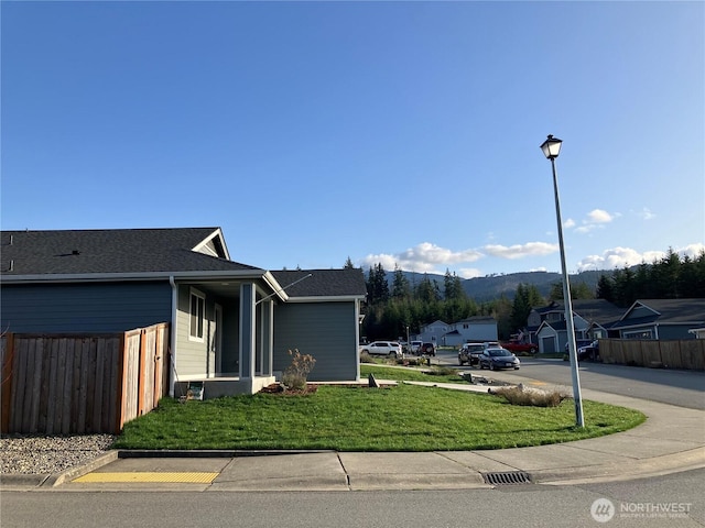3601 Page St, Port Angeles, WA 98362 - view of home's exterior featuring a mountain view and roof with shingles