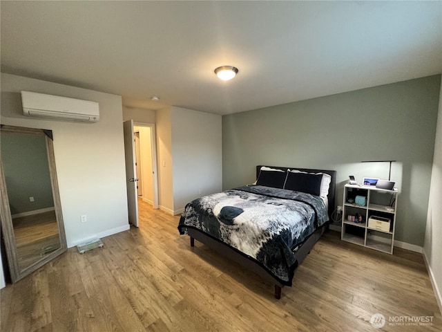 3601 Page St, Port Angeles, WA 98362 - bedroom featuring a wall unit AC and light wood-style floors