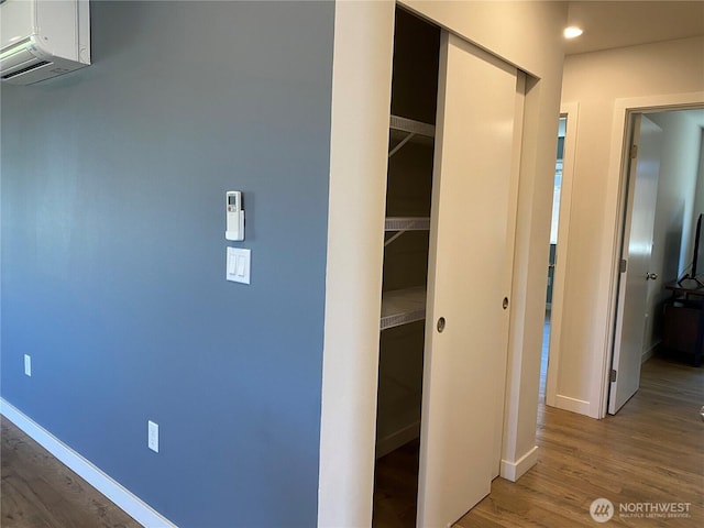 3601 Page St, Port Angeles, WA 98362 - hall with wood finished floors and a wall mounted AC