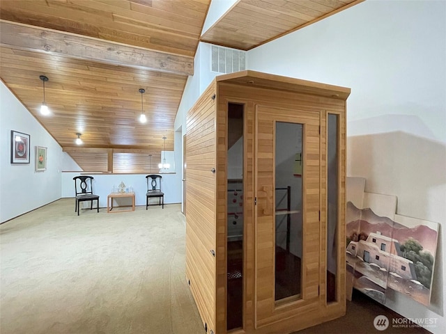 interior space featuring wooden ceiling, carpet flooring, vaulted ceiling, and a sauna