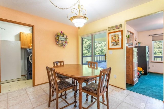 dining space with baseboards