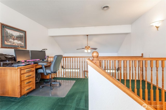 office space with dark colored carpet, visible vents, and lofted ceiling with beams