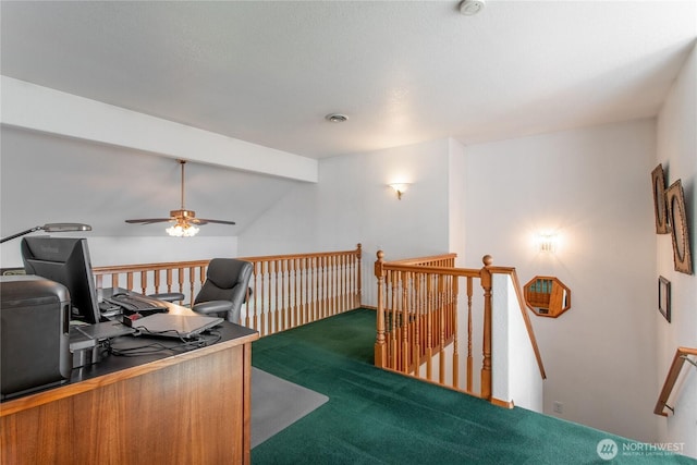 carpeted home office featuring vaulted ceiling with beams and visible vents