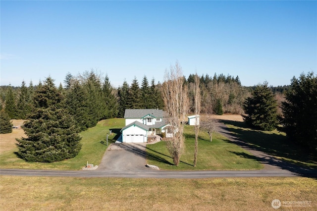 drone / aerial view with a forest view