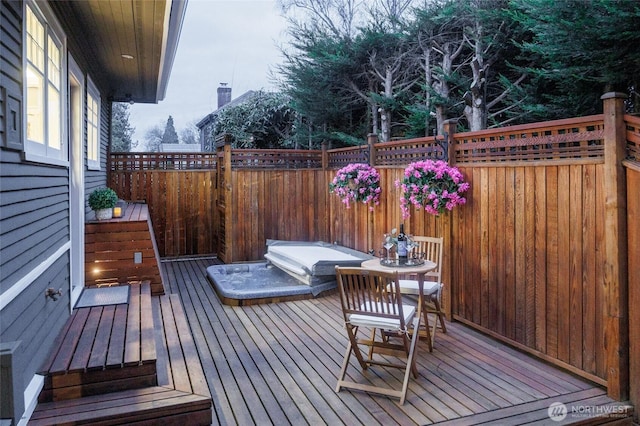 wooden terrace featuring grilling area