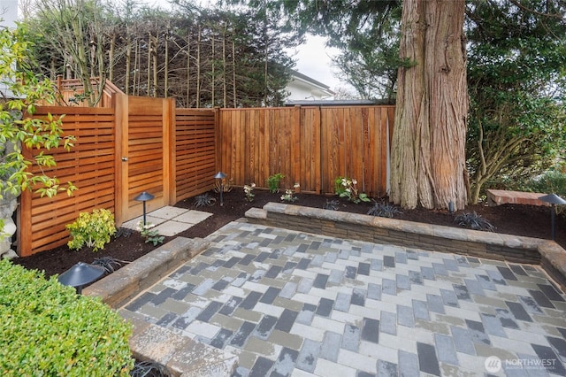 view of patio featuring a fenced backyard