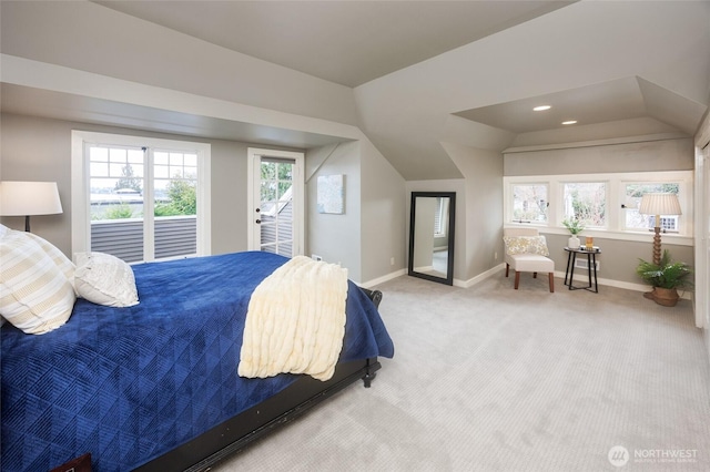 bedroom featuring access to exterior, vaulted ceiling, carpet floors, and baseboards