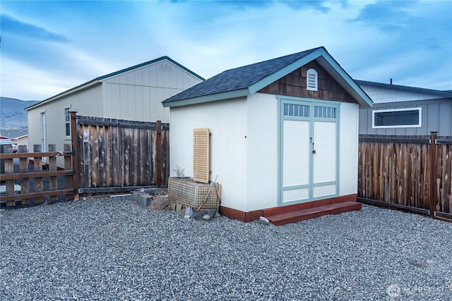 view of shed featuring a fenced backyard