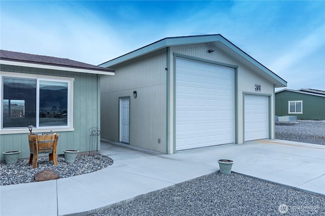 garage featuring driveway