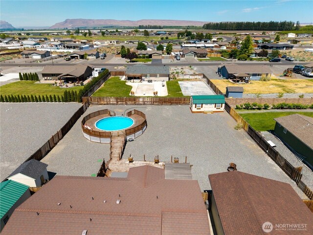 410 Airport Way SW, Mattawa, WA 99349 - aerial perspective of suburban area with a mountain backdrop