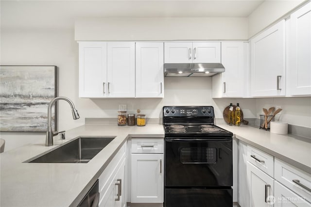 kitchen featuring light countertops, white cabinets, a sink, black range with electric cooktop, and under cabinet range hood