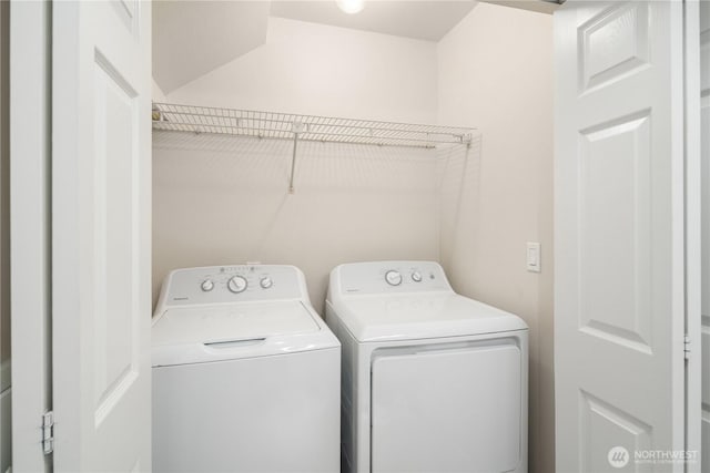 washroom featuring laundry area and independent washer and dryer