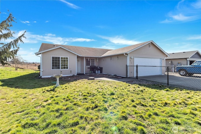 ranch-style home featuring a front yard, concrete driveway, fence, and an attached garage