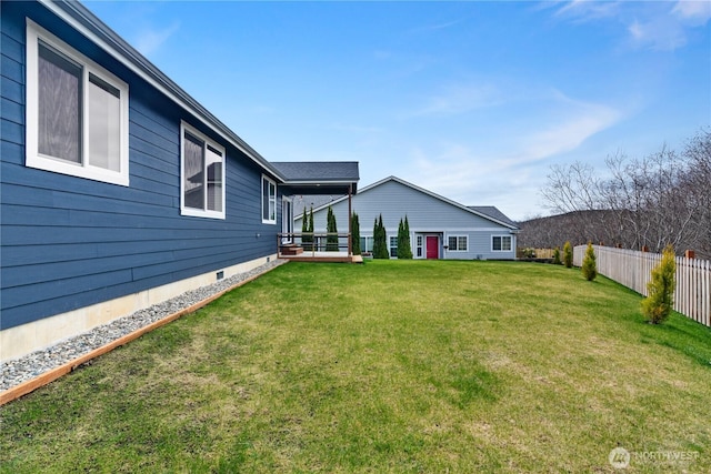 view of yard featuring fence