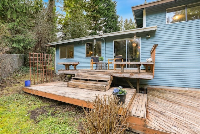 wooden deck featuring fence