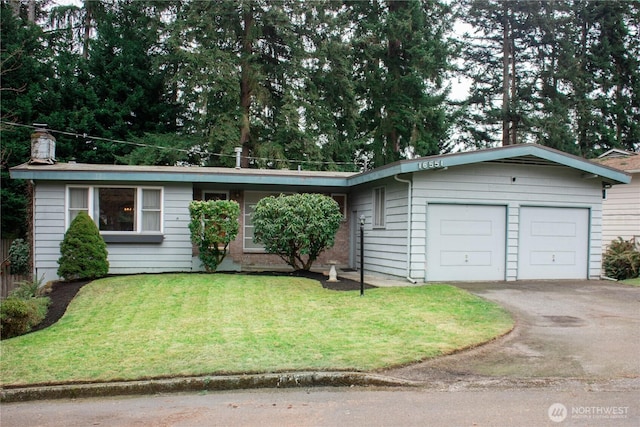 ranch-style house with a front yard, a chimney, and an attached garage