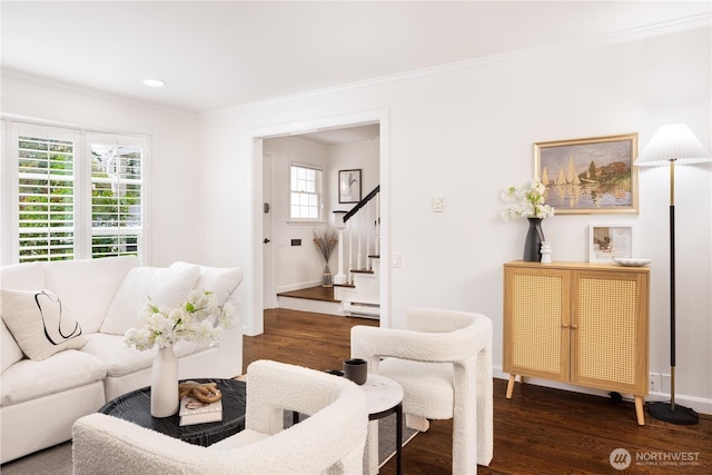 living room featuring stairway, a baseboard radiator, ornamental molding, and wood finished floors