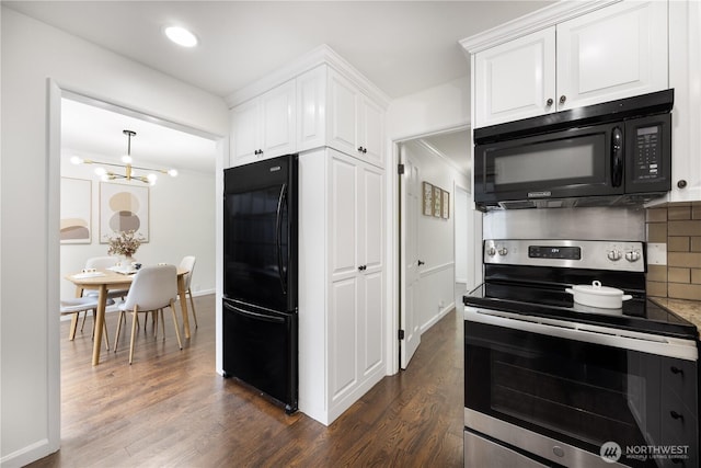 kitchen with dark wood-style floors, black appliances, decorative backsplash, and white cabinets