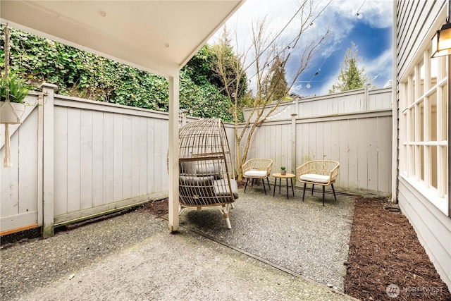 view of patio / terrace featuring a fenced backyard