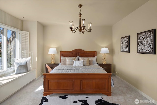 bedroom with light carpet, an inviting chandelier, and baseboards