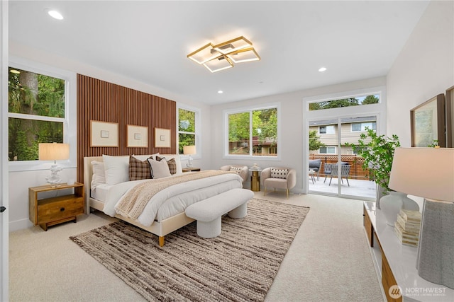 bedroom with recessed lighting, carpet floors, and access to outside