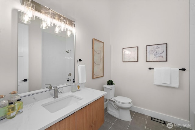 full bath with tile patterned flooring, toilet, vanity, and baseboards