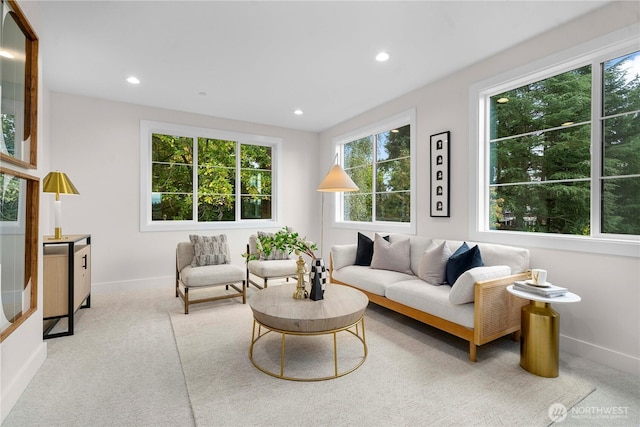 carpeted living room featuring recessed lighting and baseboards