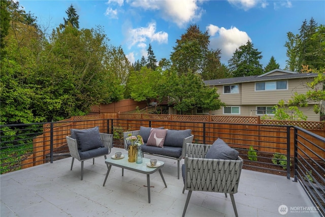 view of patio featuring a fenced backyard and an outdoor hangout area