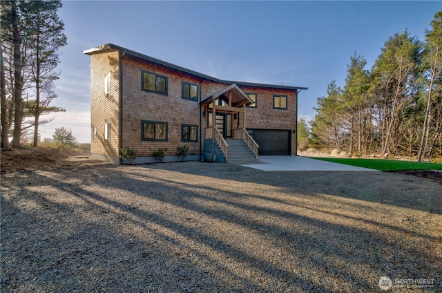 view of front facade featuring a garage and concrete driveway