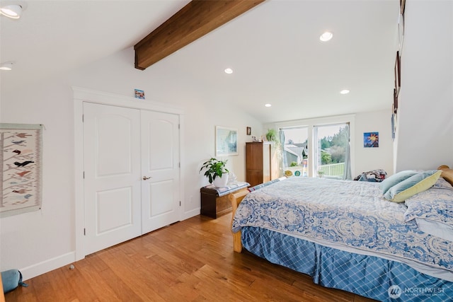 bedroom with lofted ceiling with beams, baseboards, wood finished floors, and recessed lighting