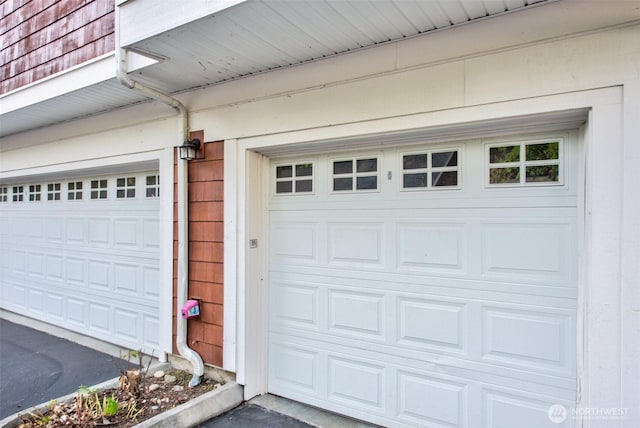 garage with driveway