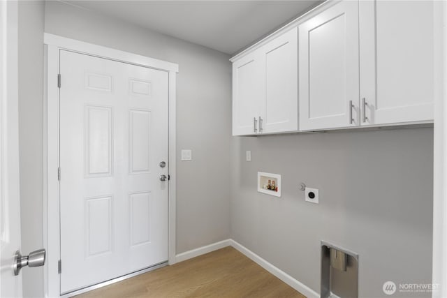 laundry room featuring cabinet space, light wood finished floors, baseboards, hookup for a washing machine, and electric dryer hookup